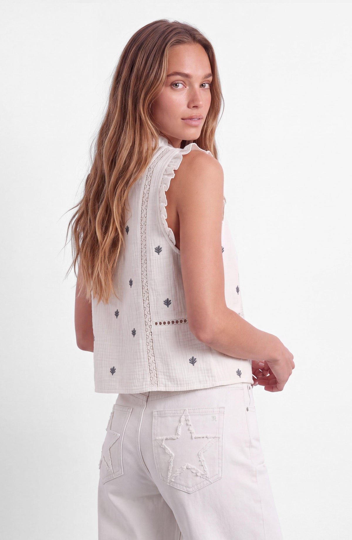 White Embroidered Sleeveless Blouse