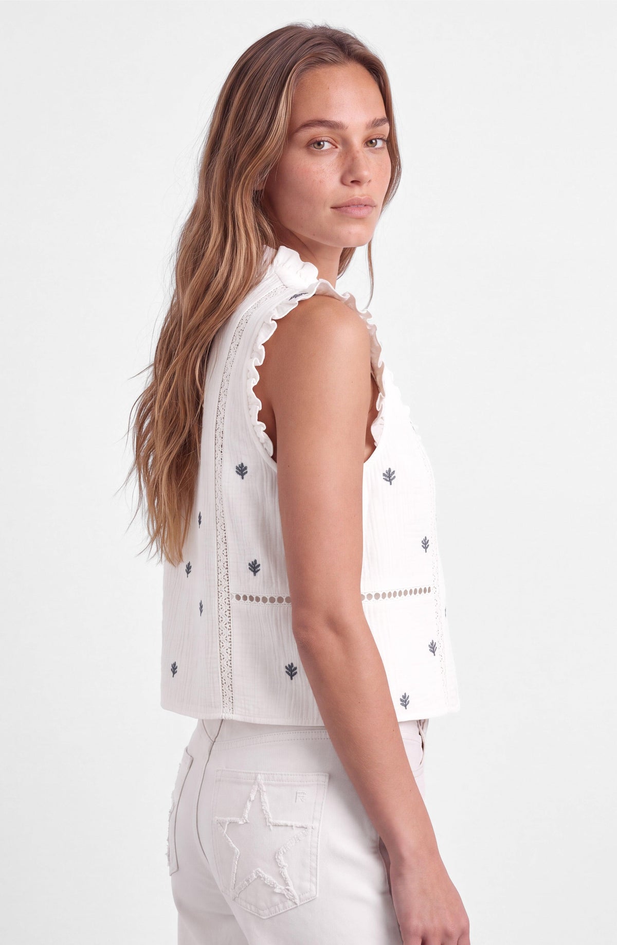 White Embroidered Sleeveless Blouse