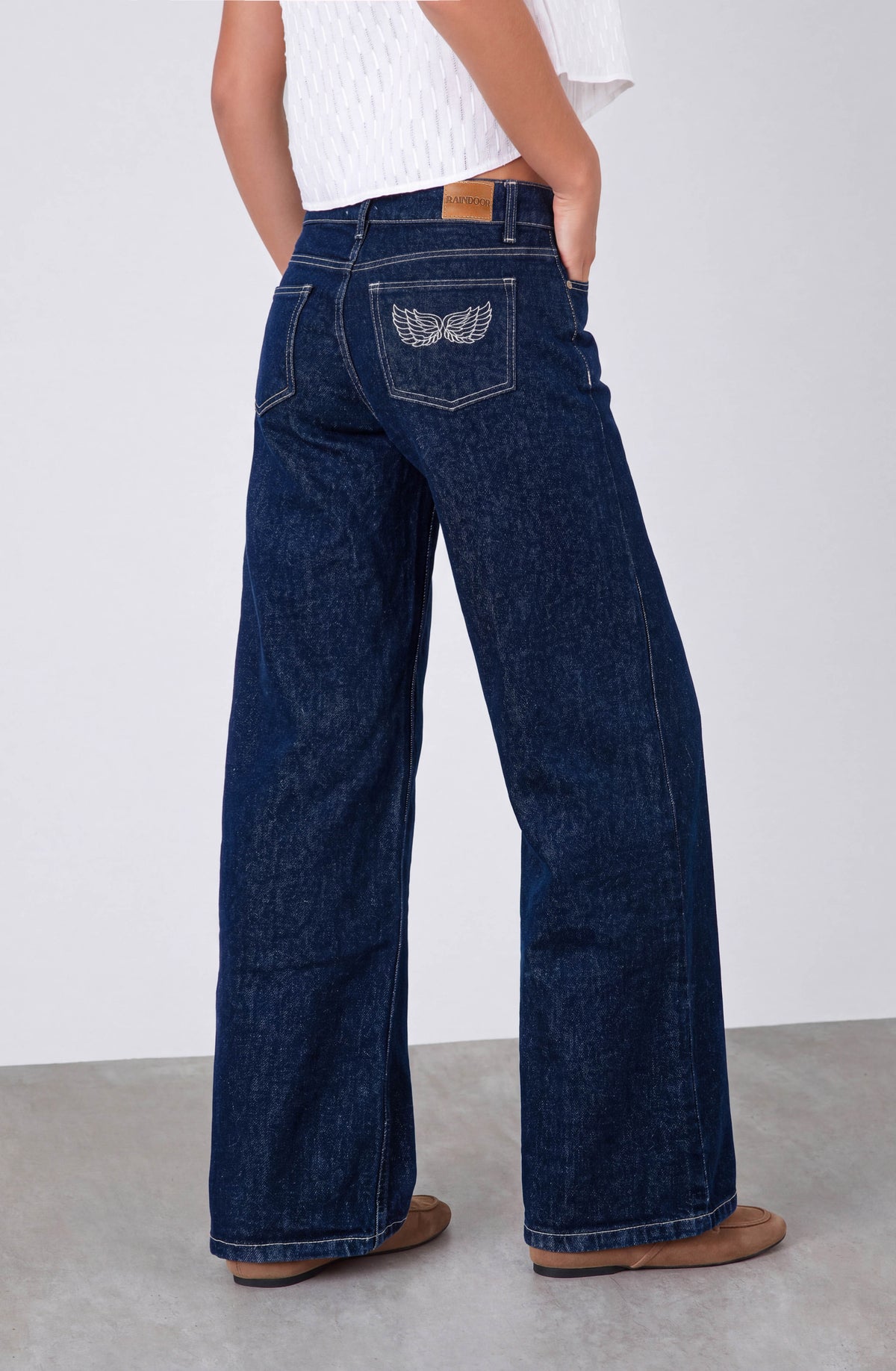 Low-Rise Embroidered Wings Pants